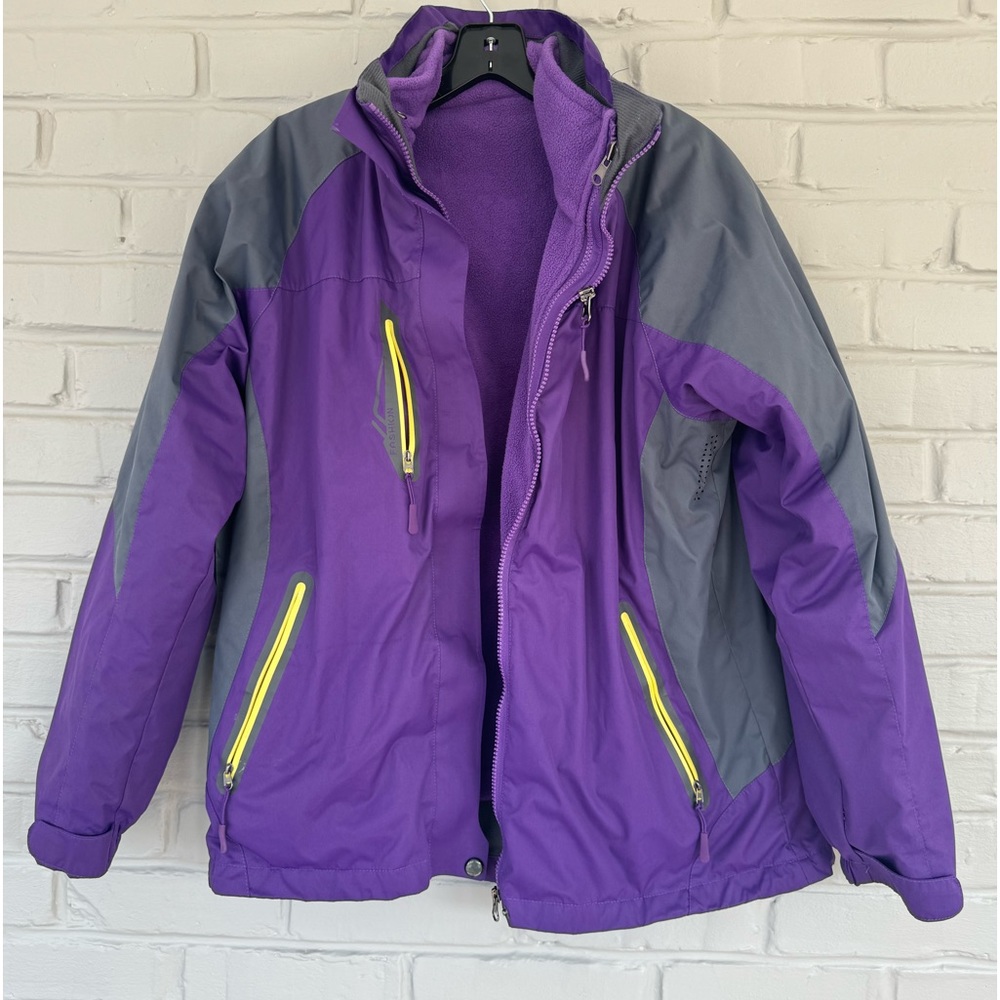 Women’s size large, purple ski jacket with removable fleece lining. UNITA brand